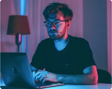 Community lead working on a laptop